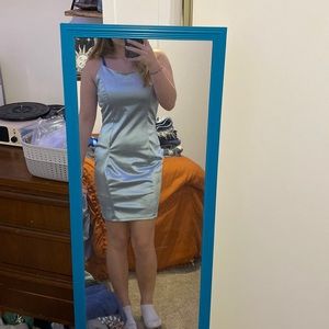 A baby boy colored body con dress